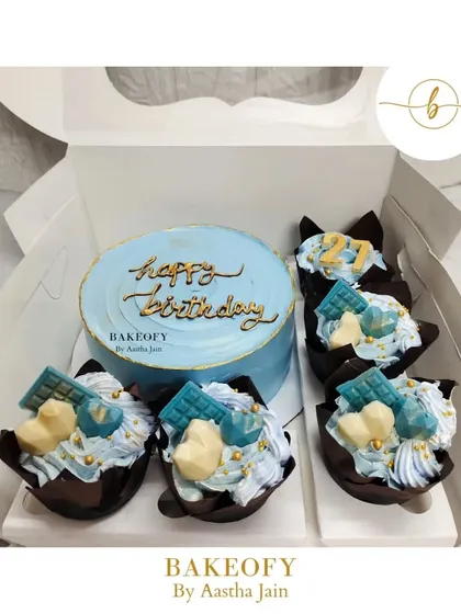 A perfect birthday hamper for a brother, featuring a Biscoff flavored cake and matching Blueberry Vanilla cupcakes. This is a great example of how I can create an elegant and delicious combo for your loved ones.