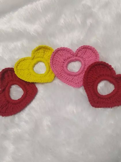 A collection of heart scrunchies ready to be shipped. I love seeing all the different color combinations customers choose.