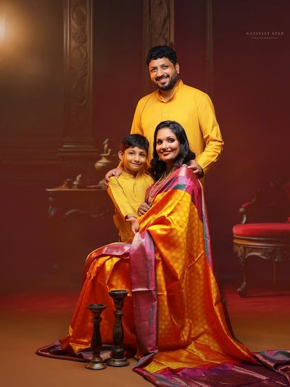 A complete family portrait, celebrating the coming of a new member. We love including siblings to capture the joy of the growing family in a traditional setting.