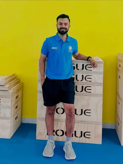 Posing with plyo boxes after a BCCI-ASCA course. Continuous learning is essential to stay at the forefront of high-performance coaching.