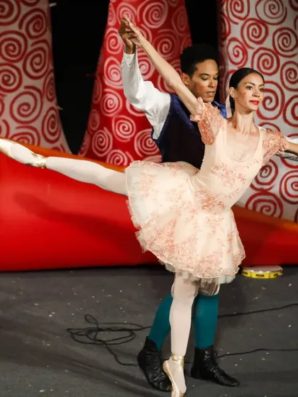 Dancers perform a graceful ballet sequence during the 'Air Giants Circus' from Brazil. Our festival programming often includes mixed media performances, combining puppetry with dance, music, and acrobatics.