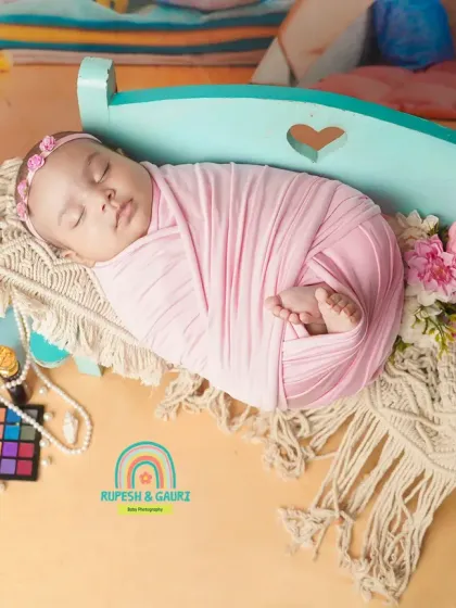 Another angle of our little fashionista, sleeping peacefully on a miniature bench. We capture both sleeping and awake shots during milestone sessions.