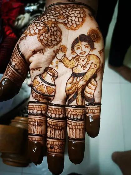 A special design for Janmashtami, featuring a portrait of little Krishna stealing butter from a pot. It’s a playful and devotional piece of art.