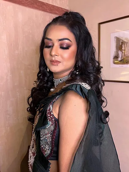 A close-up of the smokey brown eyes for the bohemian sangeet look. The dramatic effect is perfect for a night of dancing and celebration.