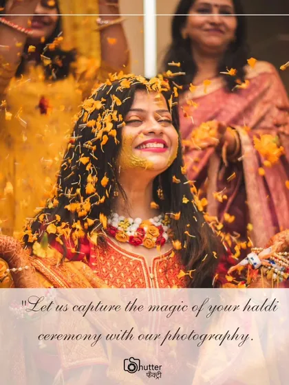 A bride's radiant smile as she is showered with marigold petals during her Haldi ceremony. We capture the peak moments of joy and celebration.