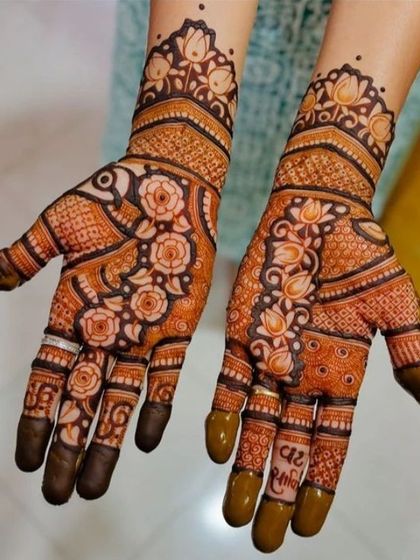 This design features beautiful, bold rose vines on both hands, with shaded petals to create a 3D effect.