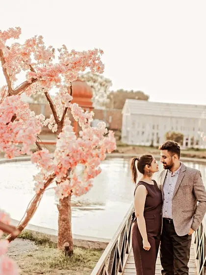 A beautiful sunset shot of a couple on our cherry blossom bridge. The warm light and romantic setting make for truly magical pre-wedding photographs.