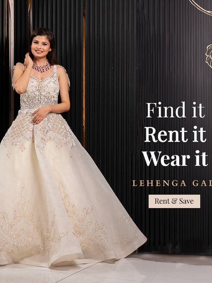 Find it, rent it, wear it. This beautiful off-white ball gown with silver embroidery is a classic and timeless rental piece for any formal wedding function.