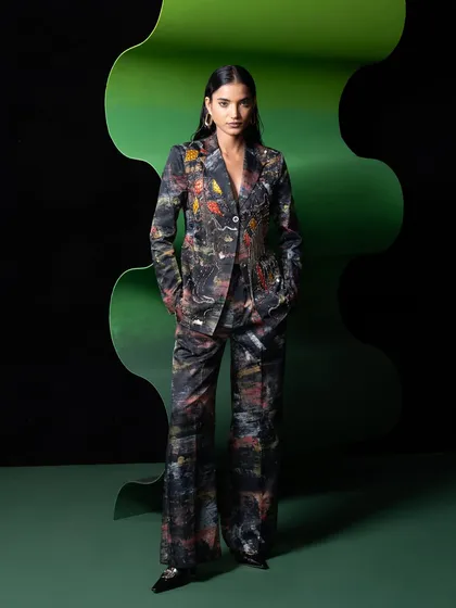 A full-length look from a campaign for designer Advait. I directed the set design with bold, graphic shapes to complement the artistic print of the pantsuit. This shot showcases my ability to create a cohesive visual world where clothing, set, and model work together.