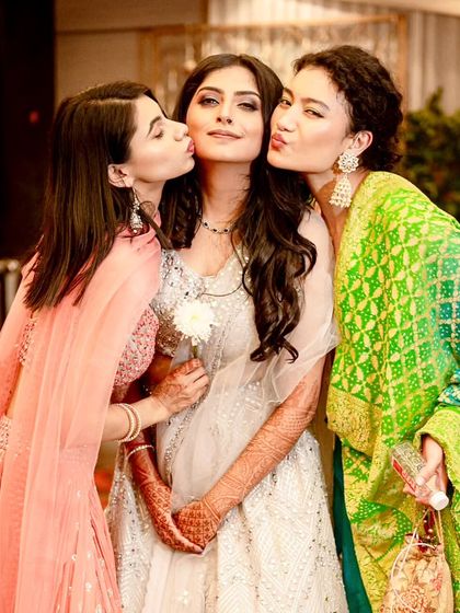 The bridesmaids are always the bride's biggest cheerleaders. A sweet moment captured after a fantastic sangeet performance.