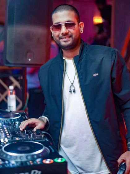 A confident pose at the console. My rules are simple: have fun, and make sure everyone else does too.