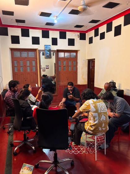 A focused group discussion during a scripting session. We foster a collaborative environment where students learn from the curriculum and from each other's creative insights.