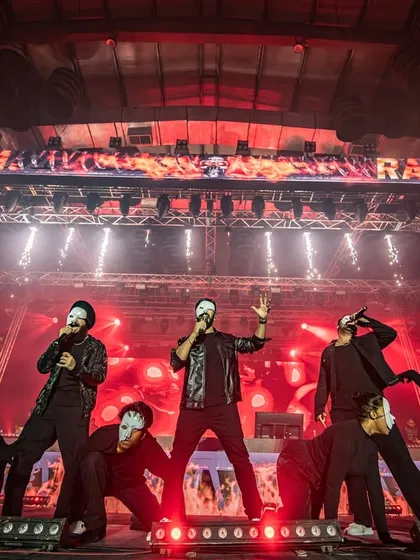 Bringing a dramatic edge to the stage for a live concert. This performance featured masked dancers and intense, moody choreography to create a high-impact, theatrical production that captivates the audience from the first beat.