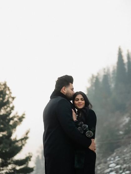 A quiet embrace with the misty mountains of Sonmarg in the background. This portrait is all about emotion, capturing a feeling of love and protection in a vast, beautiful landscape.