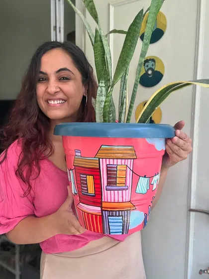 Proudly showing off another one of our hand-painted city-themed planters.