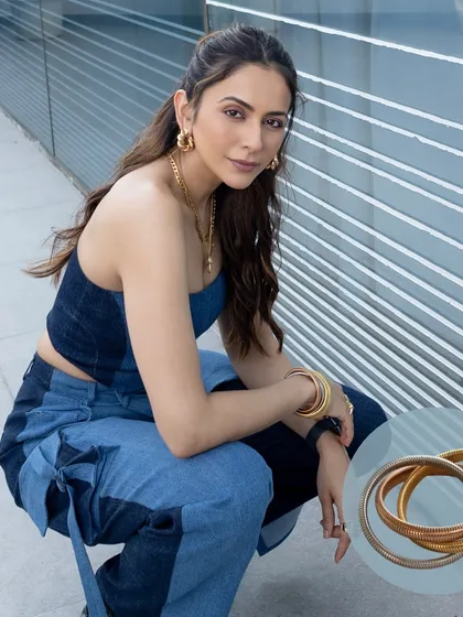 Rakul Preet looking effortlessly chic in our braided beauty hoops and a denim-on-denim outfit. She knows how to make a statement.