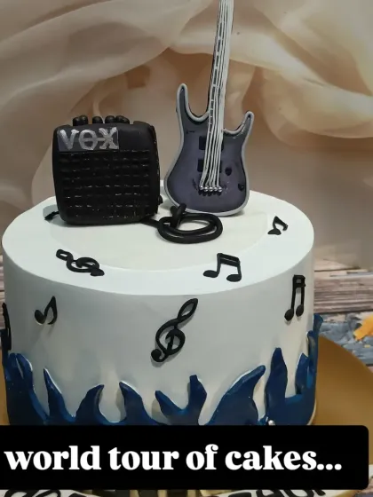 A cake for the rockstar in your life. This design features a fondant guitar, an amplifier, and musical notes, ready for a world tour of flavor.