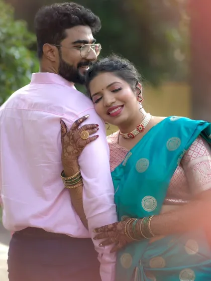 A tender moment between the couple, capturing the love and excitement of their engagement day.