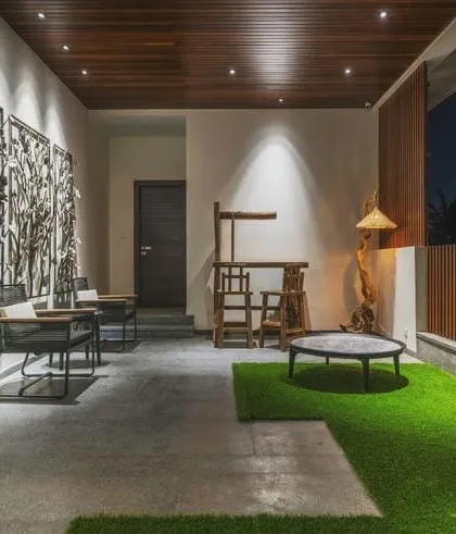 You can have a perfect lawn without the constant upkeep. We installed this high-quality artificial grass in a covered patio area, creating a durable, evergreen space for relaxation that feels great underfoot and requires zero maintenance.