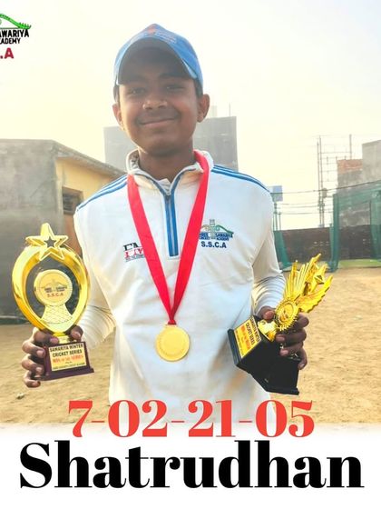 Shatrudhan with his trophies after a brilliant 5-wicket haul. He is a very promising young bowler.