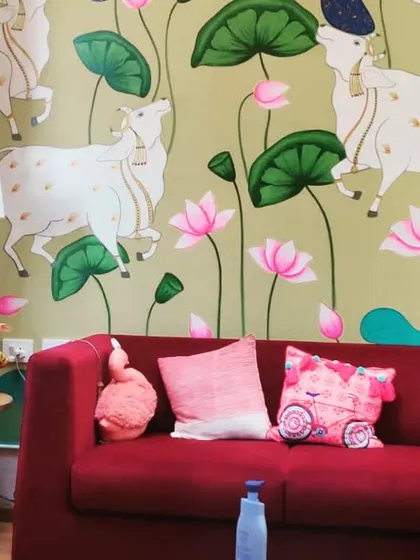 Seeing my art become part of a home is the best feeling. Here is a traditional Pichwai wall mural I painted for a residential project, bringing that 'Shivbharat' vibe to the living space. The cows and lotuses create such a peaceful atmosphere.