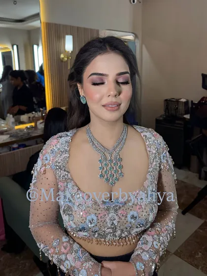 A close-up of my beautiful client Soumya. We did a soft pink smoky eye with a flawless base for a party-ready look.