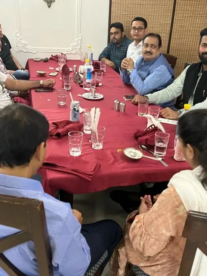 At the dinner table with JDU MLC Qamar Alam and other associates, discussing political developments in Bihar and their national implications.