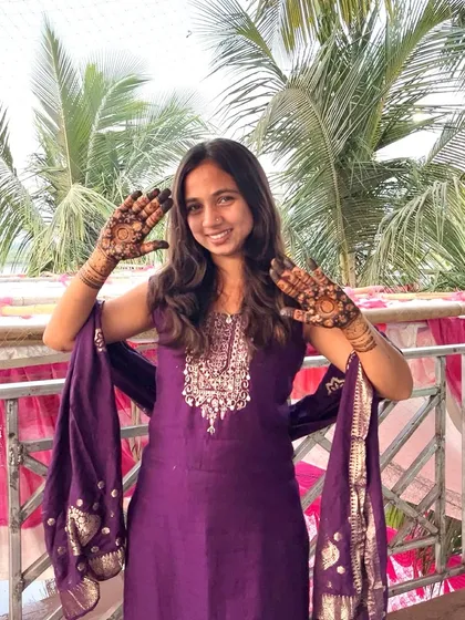 A photo of me on my own mehendi day. It was a joy to have my hands adorned with the art form I love so much.