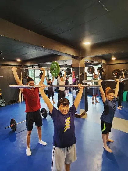 Look at this crew. We push hard, we lift heavy, but we do it together. This isn't a silent, sterile gym. This is a tribe, and we hold each other accountable.