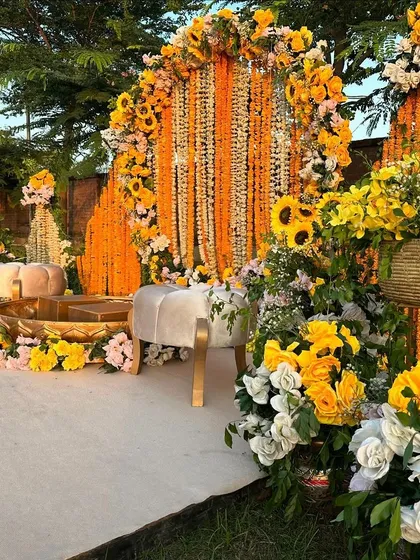 We love bringing vibrant traditions to life, like this joyful Haldi ceremony. The decor is rich with marigolds and sunflowers, creating a sun-kissed, energetic setting complete with traditional brass urlis for the rituals.