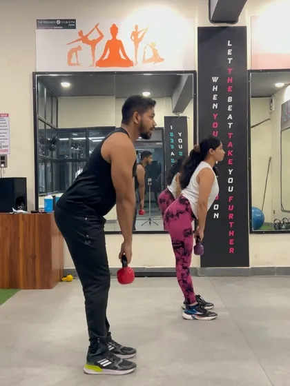 We emphasize proper form in all exercises, like this kettlebell deadlift, to ensure you build strength safely and effectively.