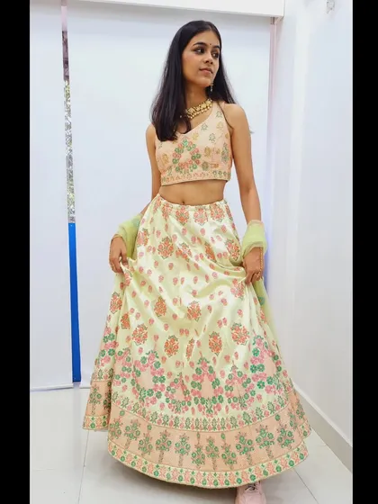 A duplicate of 227, showing the lovely pastel green lehenga.
