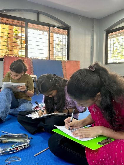 Deep in concentration. This is the magic of mandala art, it helps you tune out the noise and focus completely on the present moment and the pattern flowing from your pen.