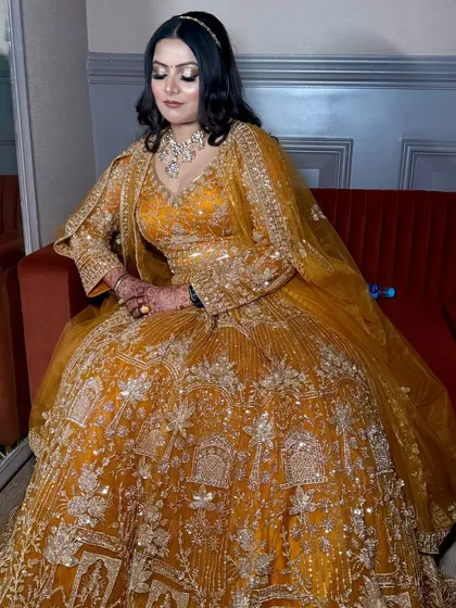The full engagement ensemble. The rich yellow color is perfect for a festive celebration.