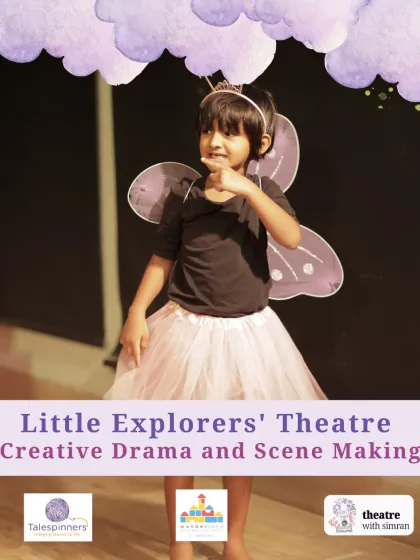 A young girl in a butterfly costume shines on stage. This is from our "Little Explorers' Theatre," a program focused on creative drama and scene making.