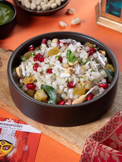 End your Navratri with a bang by ordering from our special menu. This image showcases our delicious Sabudana Khichdi, a perfect vrat-friendly meal for the festive season.