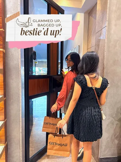 Glammed up, bagged up, bestie'd up! Two friends leaving the salon with shopping bags and fresh looks, the perfect end to a Friendship Day pamper plan.