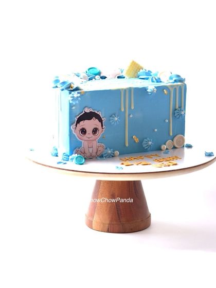 Another half-birthday cake design, this one in a square shape with a cute baby topper. This was a Butterscotch flavour cake with a white chocolate drip.