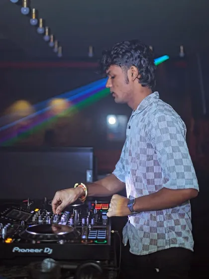 A glitchy, cool shot from a weekend gig, showing me focused on the Pioneer mixer.