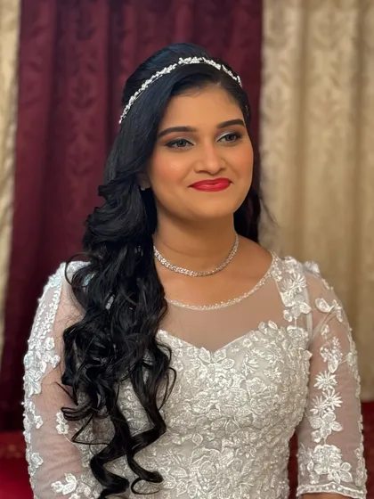 A smiling portrait of our Christian bride, looking absolutely angelic on her special day.