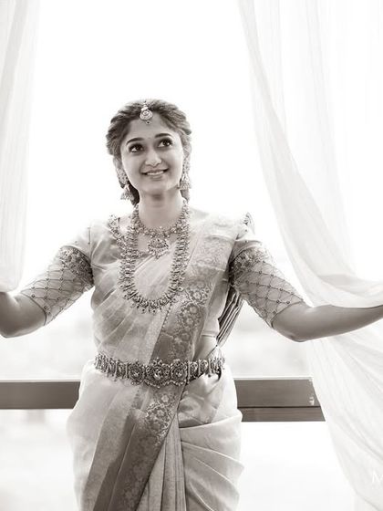 A beautiful black and white portrait that captures the bride's grace and happiness.