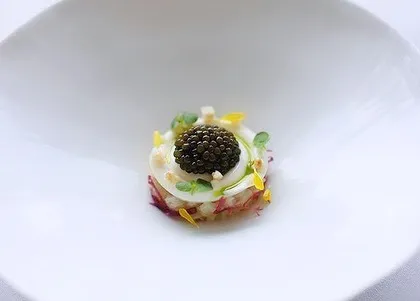 This is our take on modern Indian street food, a single bite of chaat presented with the finesse of gourmet cuisine. We use premium ingredients, including a touch of caviar, to elevate traditional flavors into a sophisticated canapé perfect for cocktail hours.