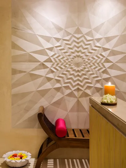 Step into Aura Spa, your personal haven for rejuvenation. The serene ambiance, marked by intricate design and soft candlelight, sets the stage for therapies that balance mind, body, and soul.