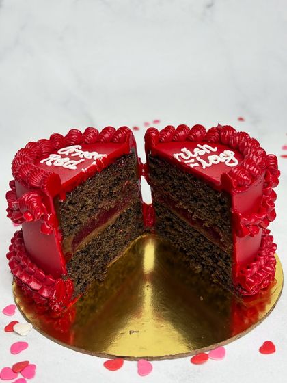 Here's the cross-section of our "Greenish Red Flag" cake. This one is the 3-berry Belgian chocolate flavor, with rich, moist chocolate cake and a tangy berry filling.