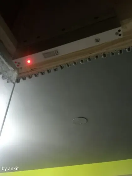 The red light on this EM lock indicates that the door is securely locked. This is a crucial component for ensuring the gym's security after hours.
