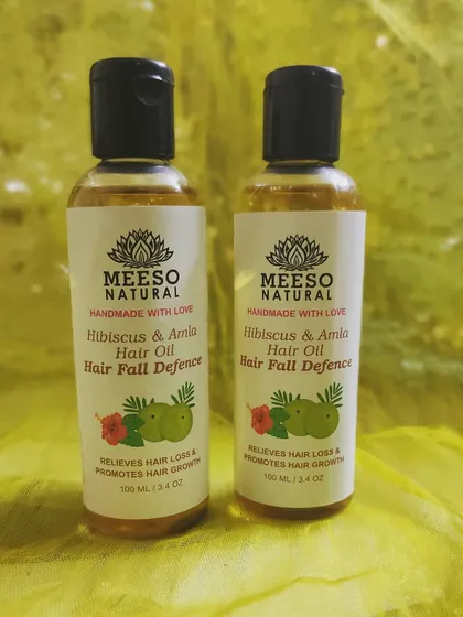 Our Hibiscus & Amla Hair Oil is a cornerstone of our hair care line. It is formulated to address hair loss and promote stronger, healthier hair using traditional Ayurvedic ingredients.