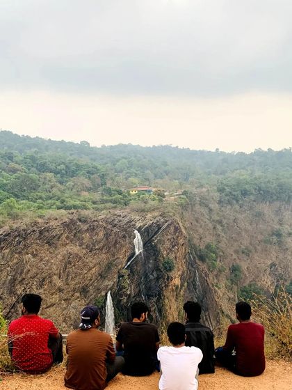 A quiet moment for some of our travelers overlooking the majestic Jog Falls.