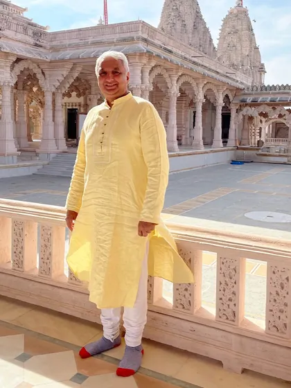 Did you know hemp fabric is one of the most sustainable materials available? It's strong, durable, and requires less water to grow. Here, a client embraces style and sustainability in his natural hemp kurta.