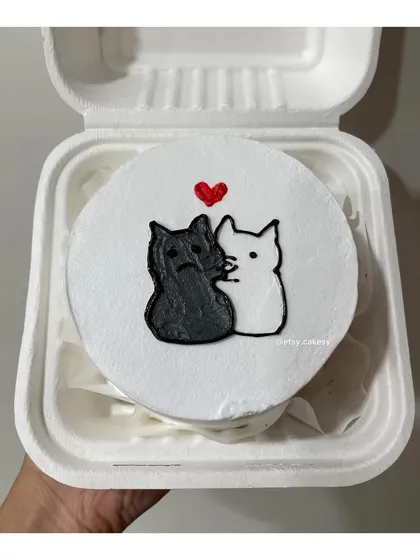 A repeat of the adorable cuddling cats design, a very popular choice for partners and friends.
