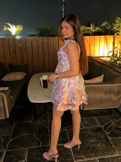 A side profile of my birthday dress, showing the delicate details and flattering fit.